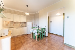 Apartment, 1 Bedroom (BILO) | Living area | Flat-screen TV