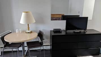 32-inch flat-screen TV with cable channels, TV