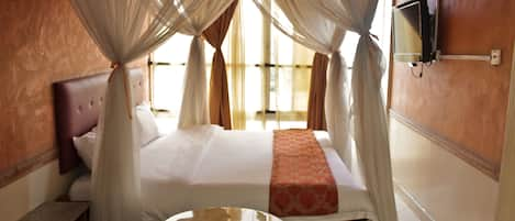 Deluxe Room | Premium bedding, minibar, in-room safe, desk