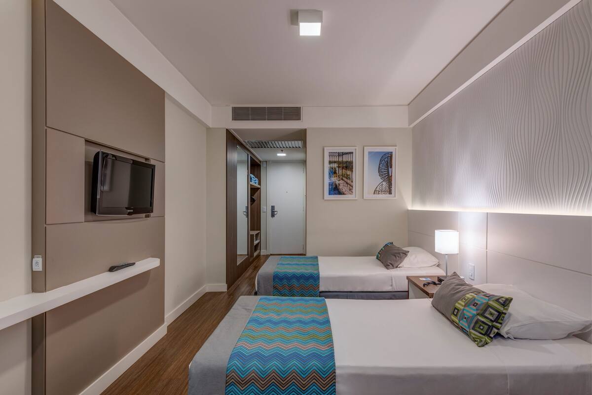 Standard Twin Room, 2 Twin Beds | Minibar, in-room safe, individually decorated, individually furnished