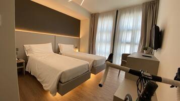 Habitación estándar con 2 camas individuales, 2 camas individuales | Edredón, camas Select Comfort y minibar