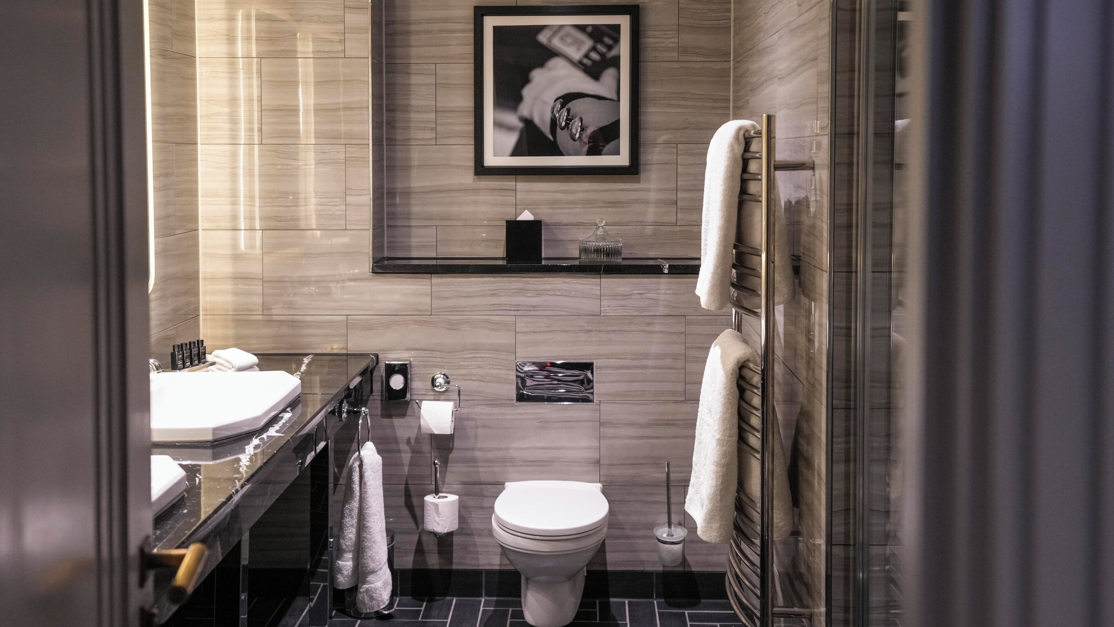 shower, rainfall showerhead, designer toiletries, hair dryer