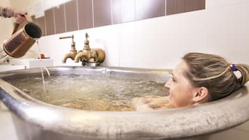 Tratamientos corporales y masajes con piedras calientes