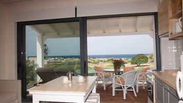 Suite, 1 Bedroom, Sea View (Louiza) | Private kitchen | Full-size fridge, microwave, oven, stovetop