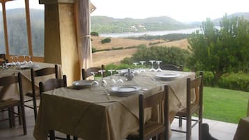 Breakfast, lunch, dinner served; local cuisine, garden views
