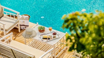 Outdoor pool, pool umbrellas, pool loungers