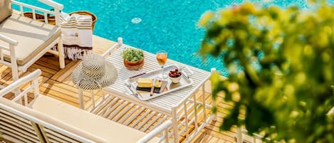 Outdoor pool, pool umbrellas, pool loungers