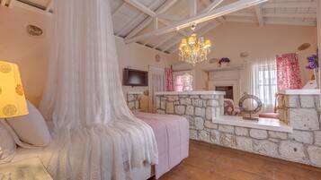 Suite, Fireplace | Minibar, in-room safe, soundproofing, iron/ironing board