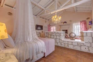 Suite, Fireplace | Minibar, in-room safe, soundproofing, iron/ironing board