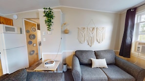 Cottage, 4 Bedrooms | Living area | Flat-screen TV