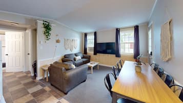 Cottage, 4 Bedrooms | Living area | Flat-screen TV