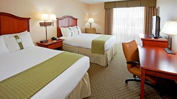 Hypo-allergenic bedding, desk, laptop workspace, blackout curtains