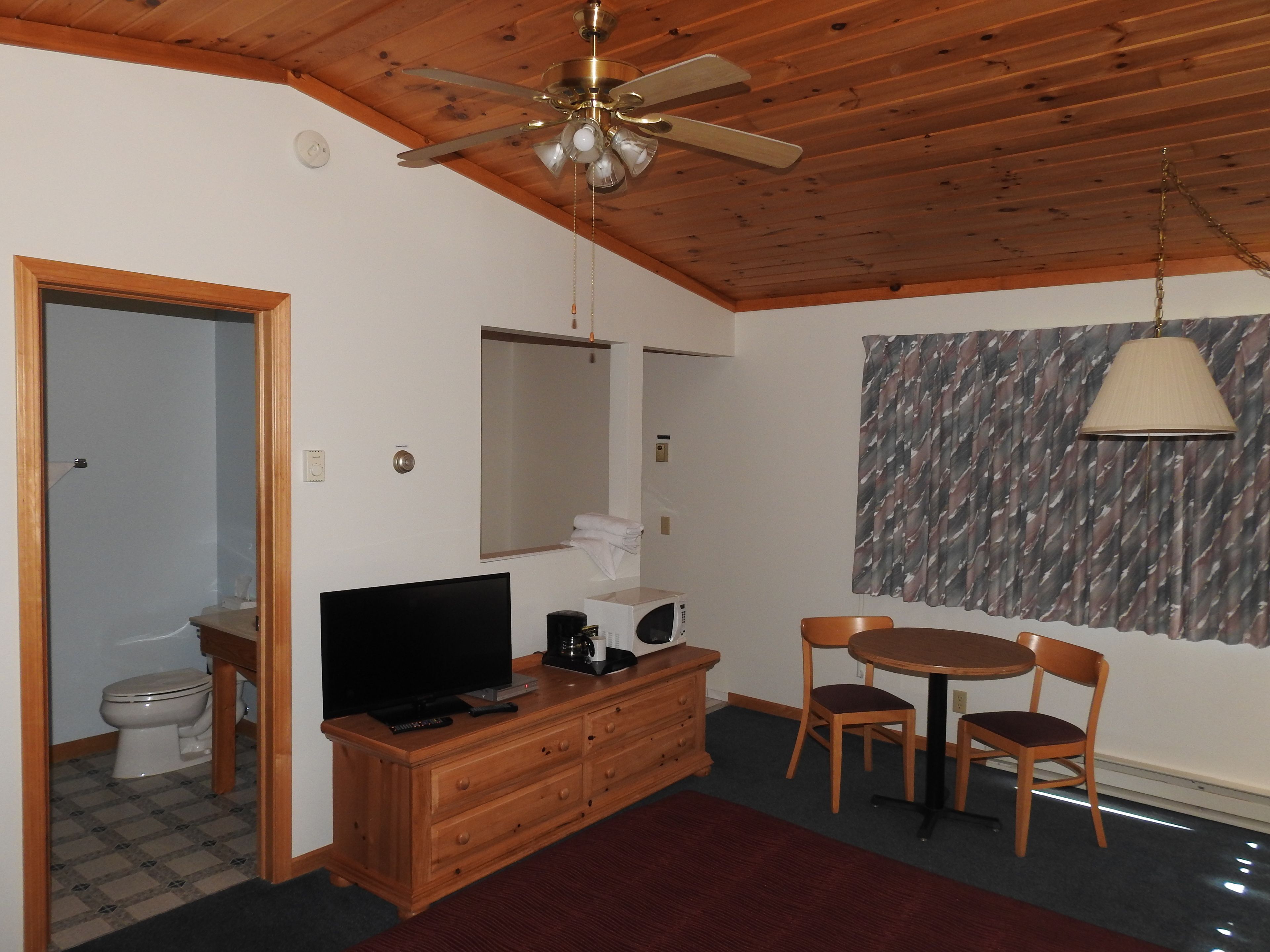 room, whirlpool, fireplace, lake view | living area | flat-screen tv, dvd player