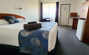 Deluxe Double Room | Desk, laptop workspace, iron/ironing board, cribs/infant beds