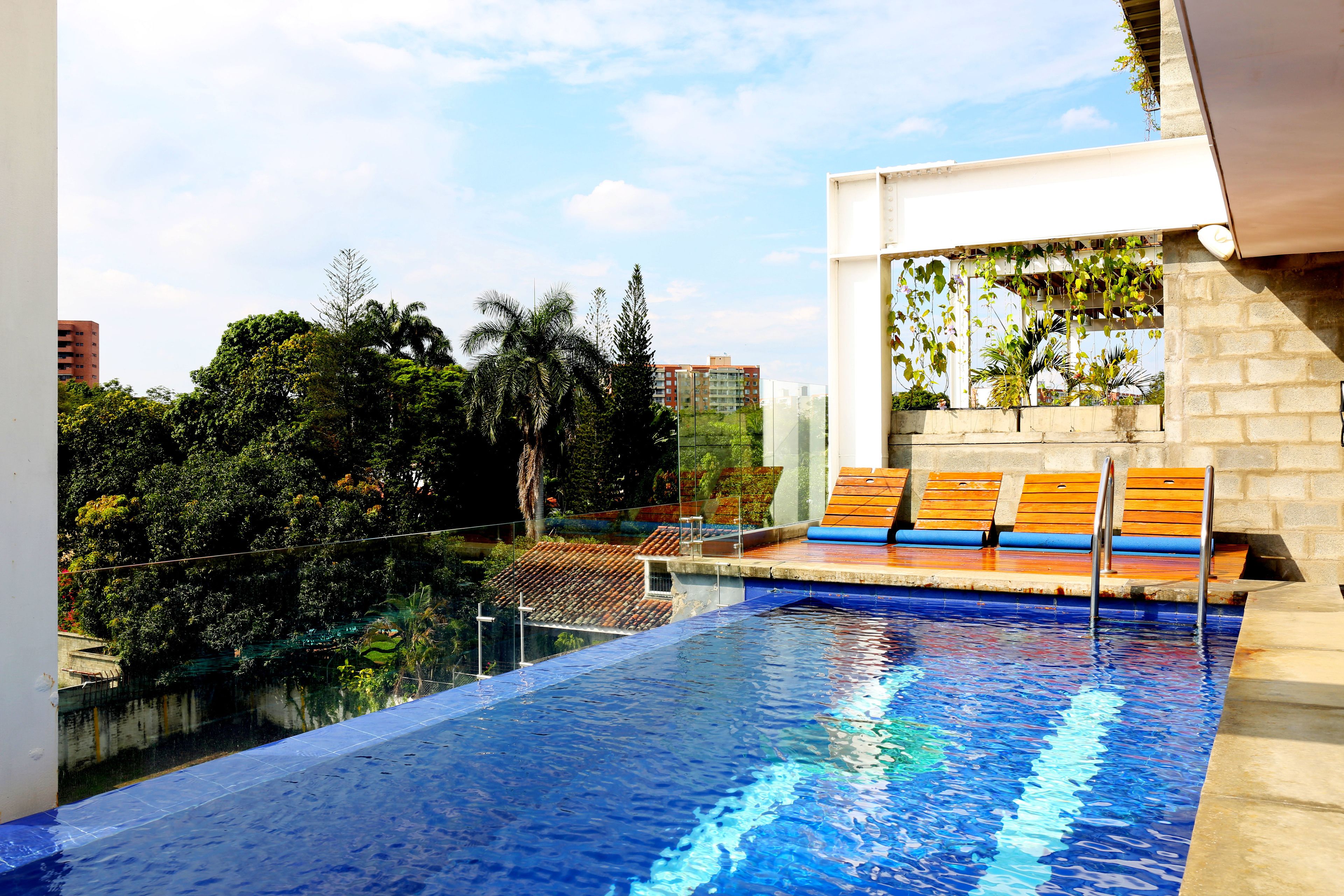 indoor pool, outdoor pool, pool loungers