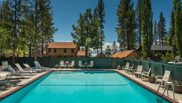 Outdoor pool, open 9 AM to 9 PM, pool umbrellas, pool loungers