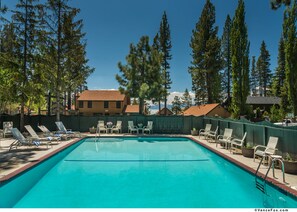 Outdoor pool, open 9 AM to 9 PM, pool umbrellas, sun loungers
