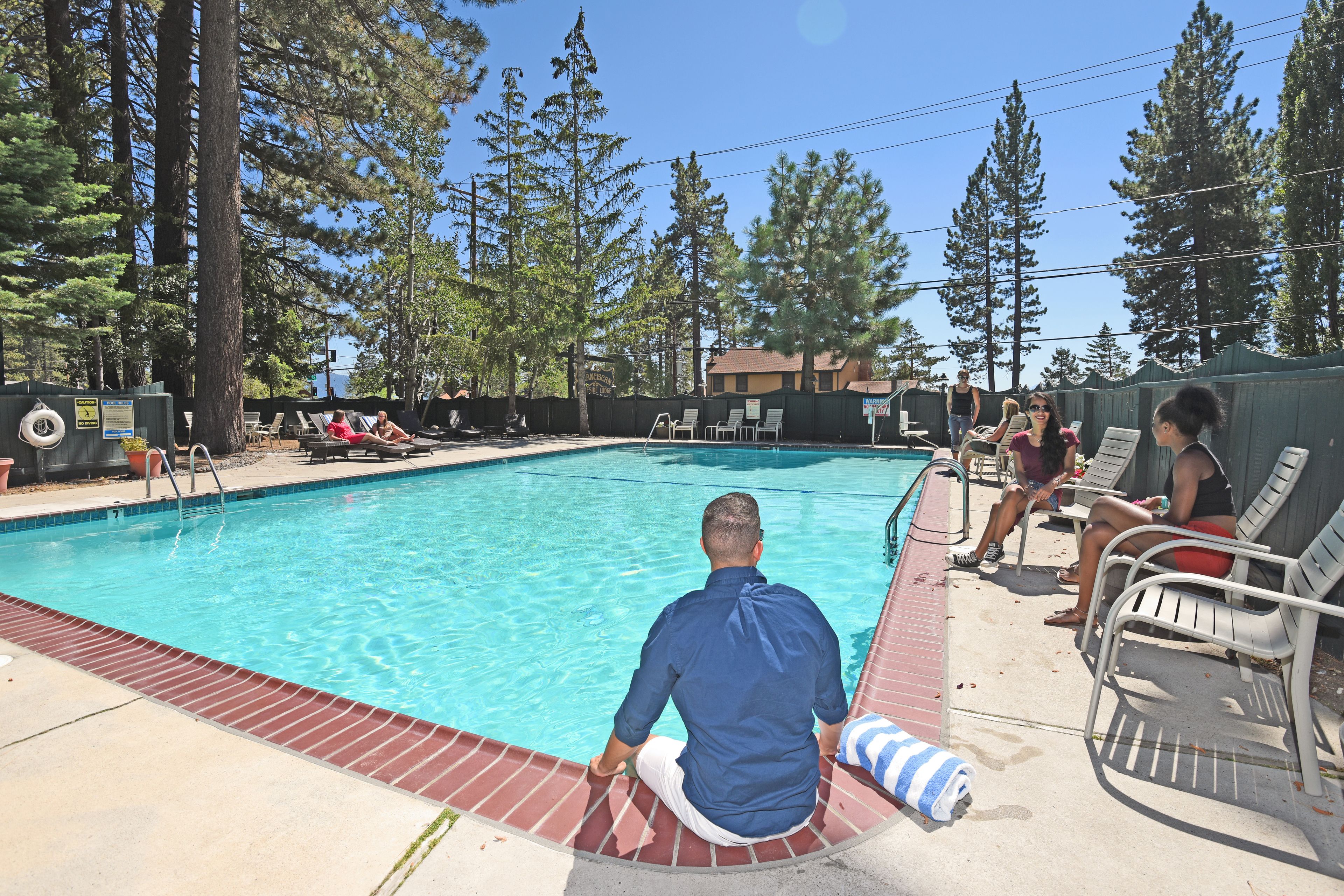 Outdoor pool, open 9 AM to 9 PM, pool umbrellas, pool loungers