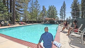 Outdoor pool, open 9 AM to 9 PM, pool umbrellas, pool loungers