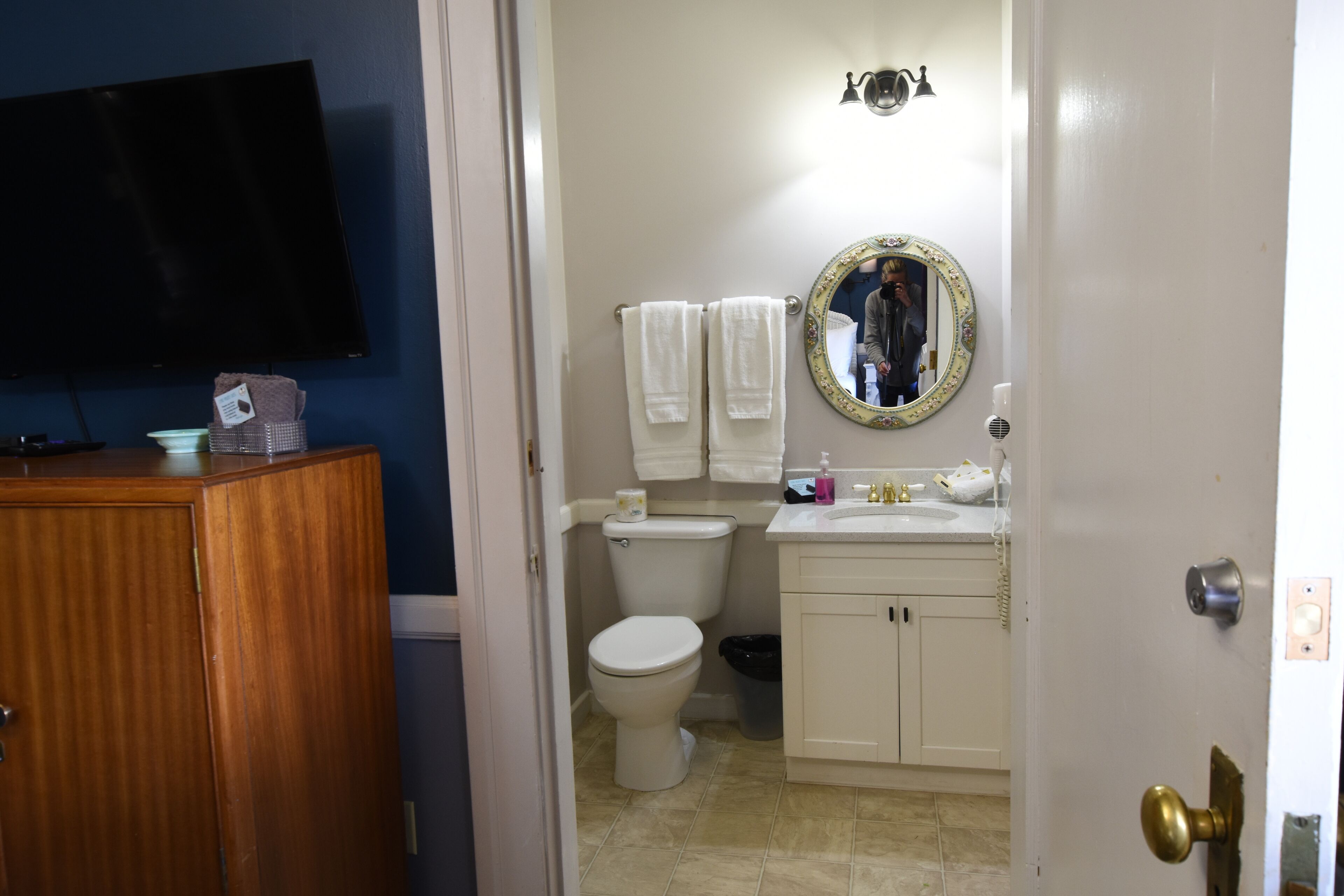 hair dryer, towels, soap, shampoo