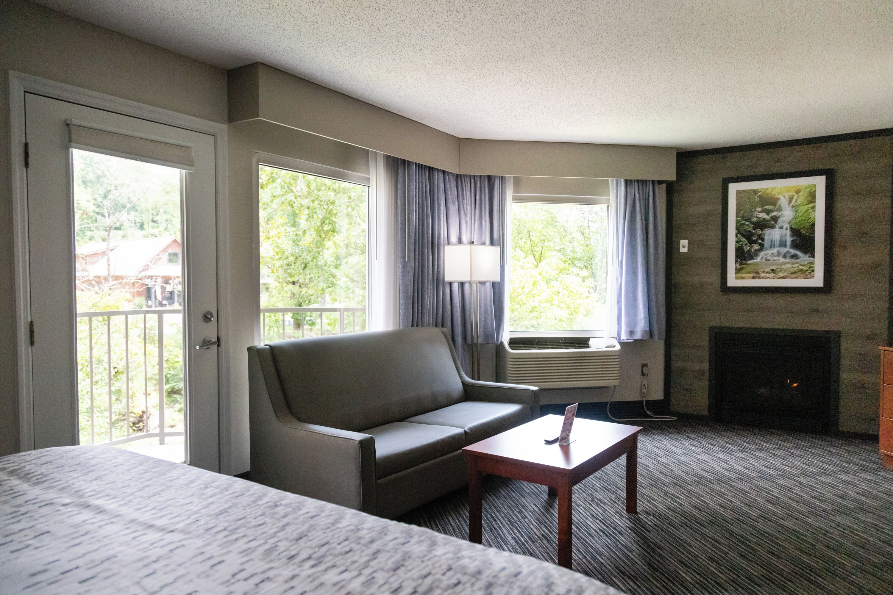 newly renovated 1 king bed with sofa bed, fireplace, jetted tub, private balcony on river | 1 bedroom, desk, laptop workspace, blackout curtains