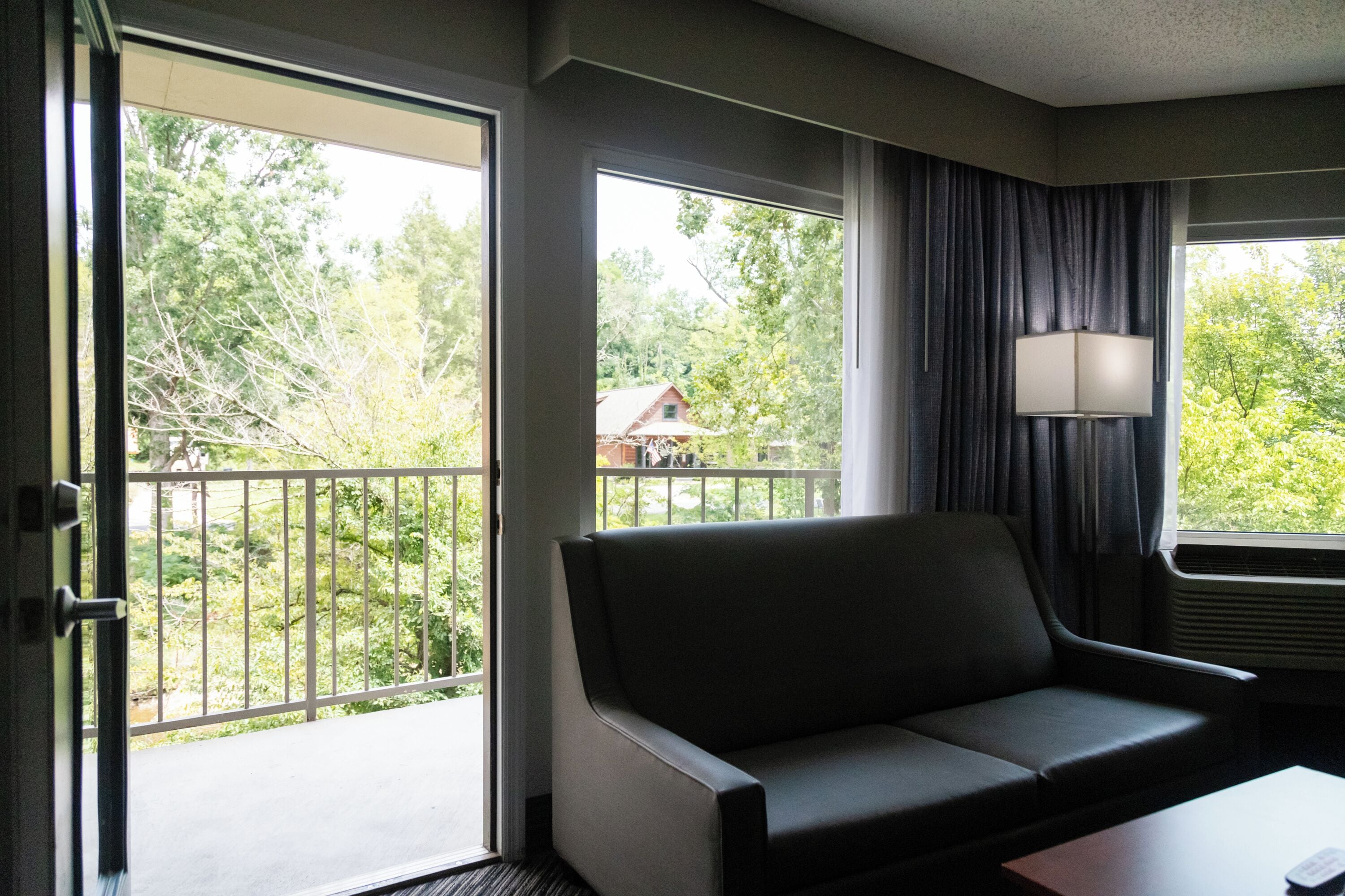 newly renovated 1 king bed with sofa bed, fireplace, jetted tub, private balcony on river | 1 bedroom, desk, laptop workspace, blackout curtains