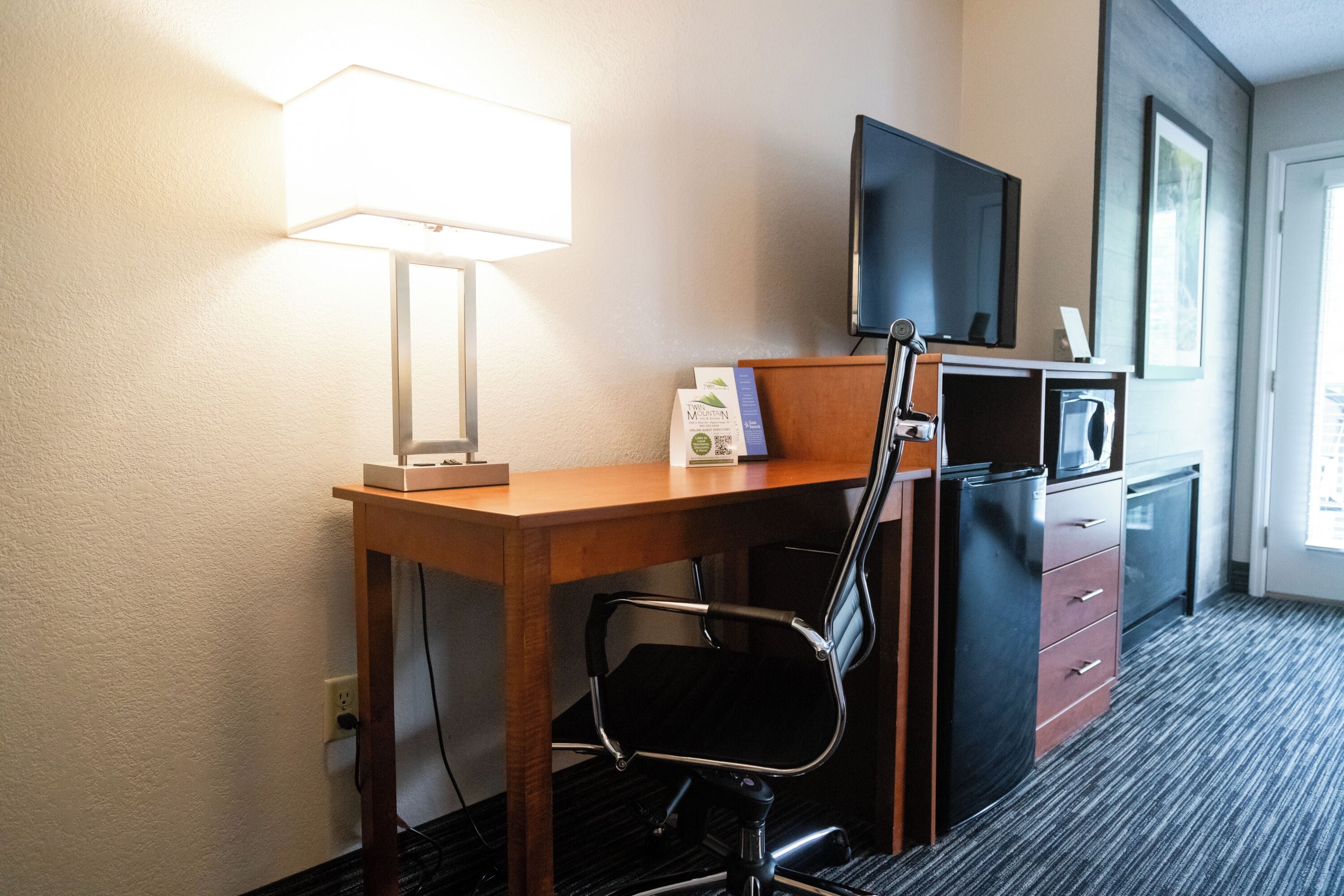 newly renovated 2 queen beds, fireplace, private balcony on river (mobility accessible) | 1 bedroom, desk, laptop workspace, blackout curtains