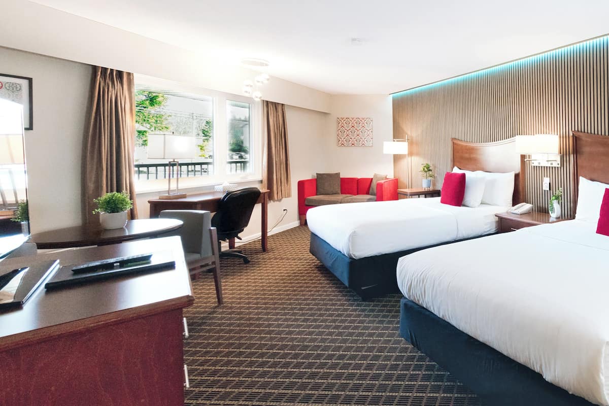 Deluxe Room, 2 Queen Beds, Kitchenette | Premium bedding, desk, iron/ironing board, bed sheets