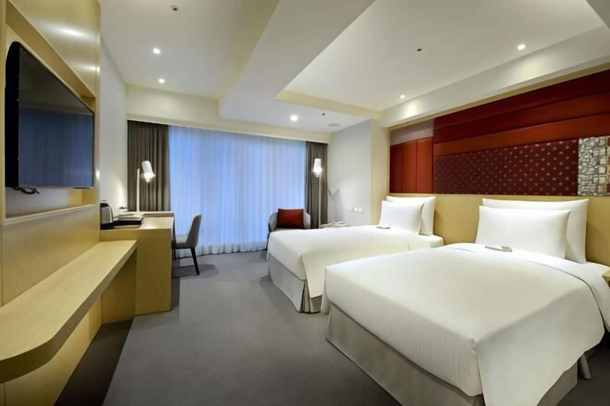 Luxe beddengoed, donzen dekbedden, een kluis op de kamer
