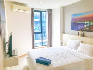 Deluxe Double Room with Pool View | 1 bedroom, in-room safe, individually decorated, individually furnished