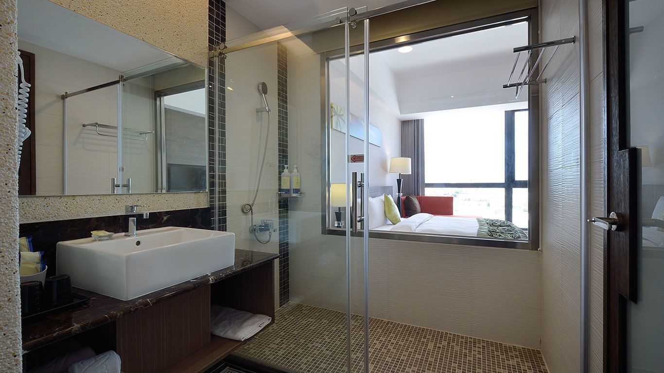 standard room | bathroom | shower, hair dryer, slippers, towels