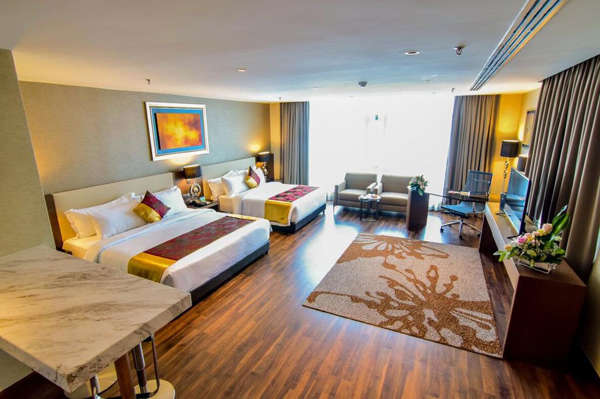 family suite, private bathroom, city view | 1 bedroom, free minibar, in-room safe, desk
