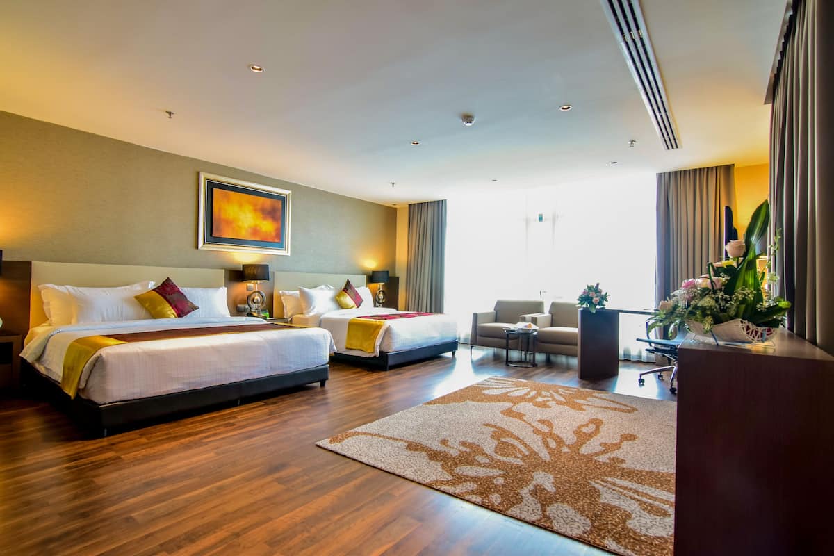 family suite, private bathroom, city view | 1 bedroom, free minibar, in-room safe, desk
