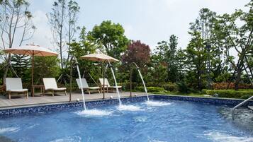 Outdoor pool, open 7:00 AM to 9:00 PM, pool umbrellas, sun loungers