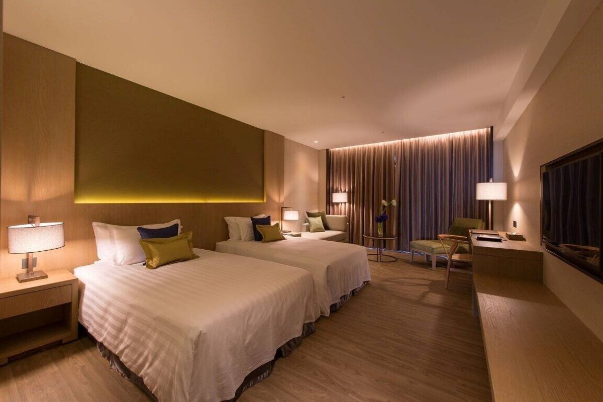 Habitación clásica con 2 camas individuales, vista a la montaña | Edredón, caja de seguridad en la habitación y cunas gratuitas
