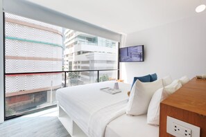 Minibar, caja de seguridad en la habitación y cortinas blackout