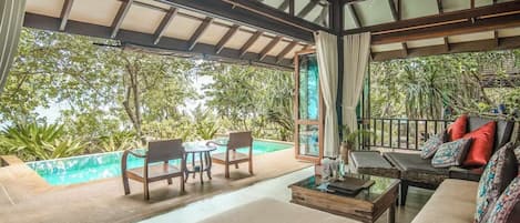 Villa luxueuse, 1 chambre, piscine privée, en face de la plage (Adult Only) | Aire de séjour