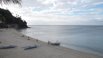 On the beach, white sand