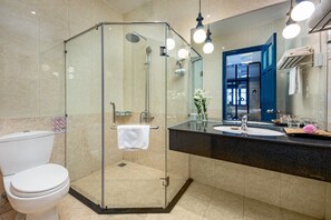 Shower, free toiletries, hair dryer, slippers