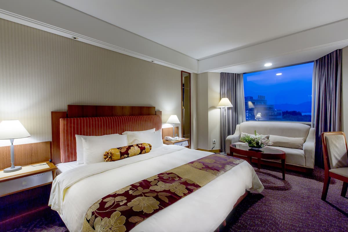 Partial Lake View Deluxe Double or Twin Room | Minibar, in-room safe, desk, blackout curtains