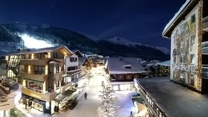 A snow-covered town with buildings, including a hotel named 'SPORTHOTEL PORTCA'. - Sporthotel St. Anton (Sankt Anton am Arlberg)