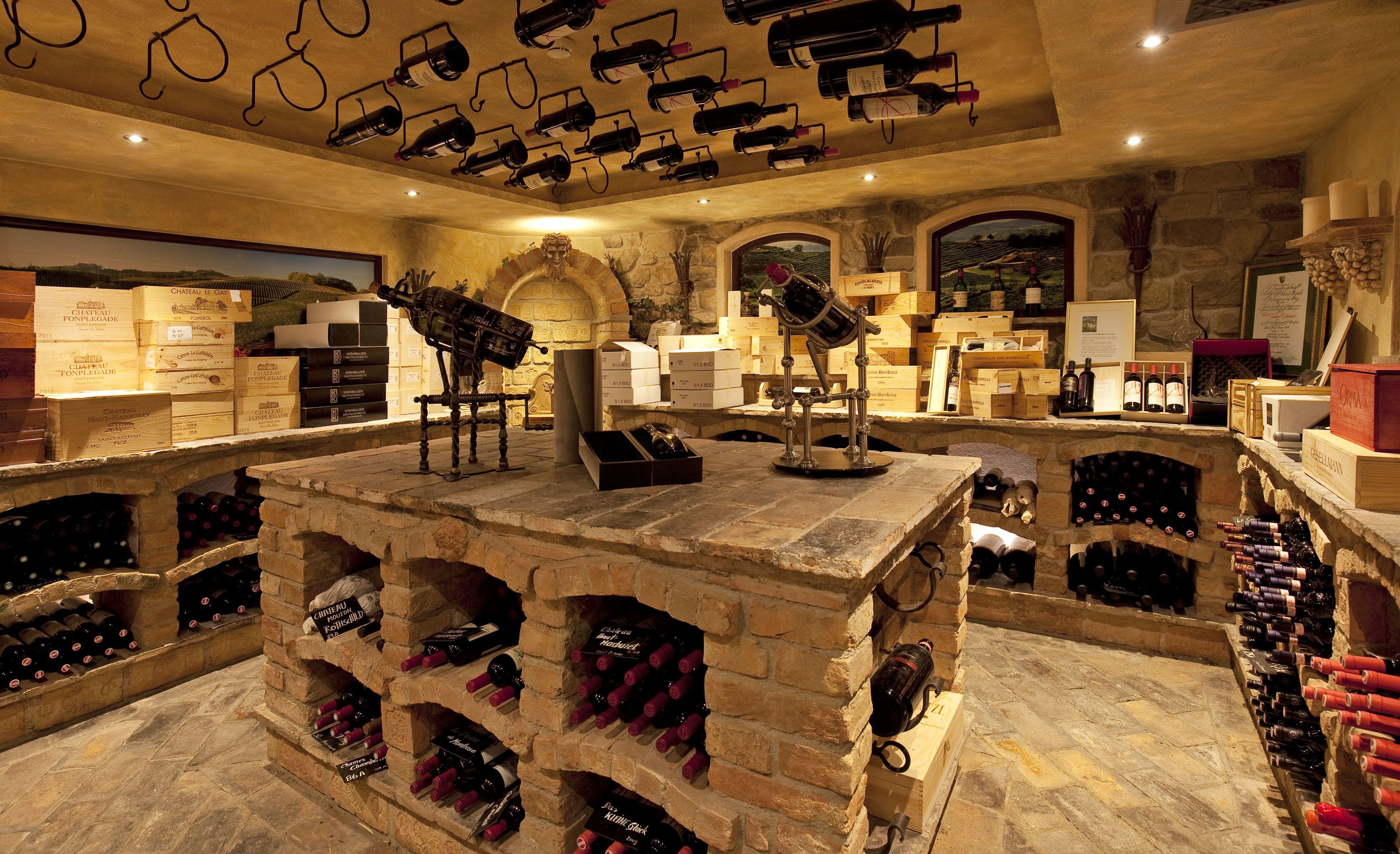 A wine cellar with multiple wine racks and a central display of wine bottles.
