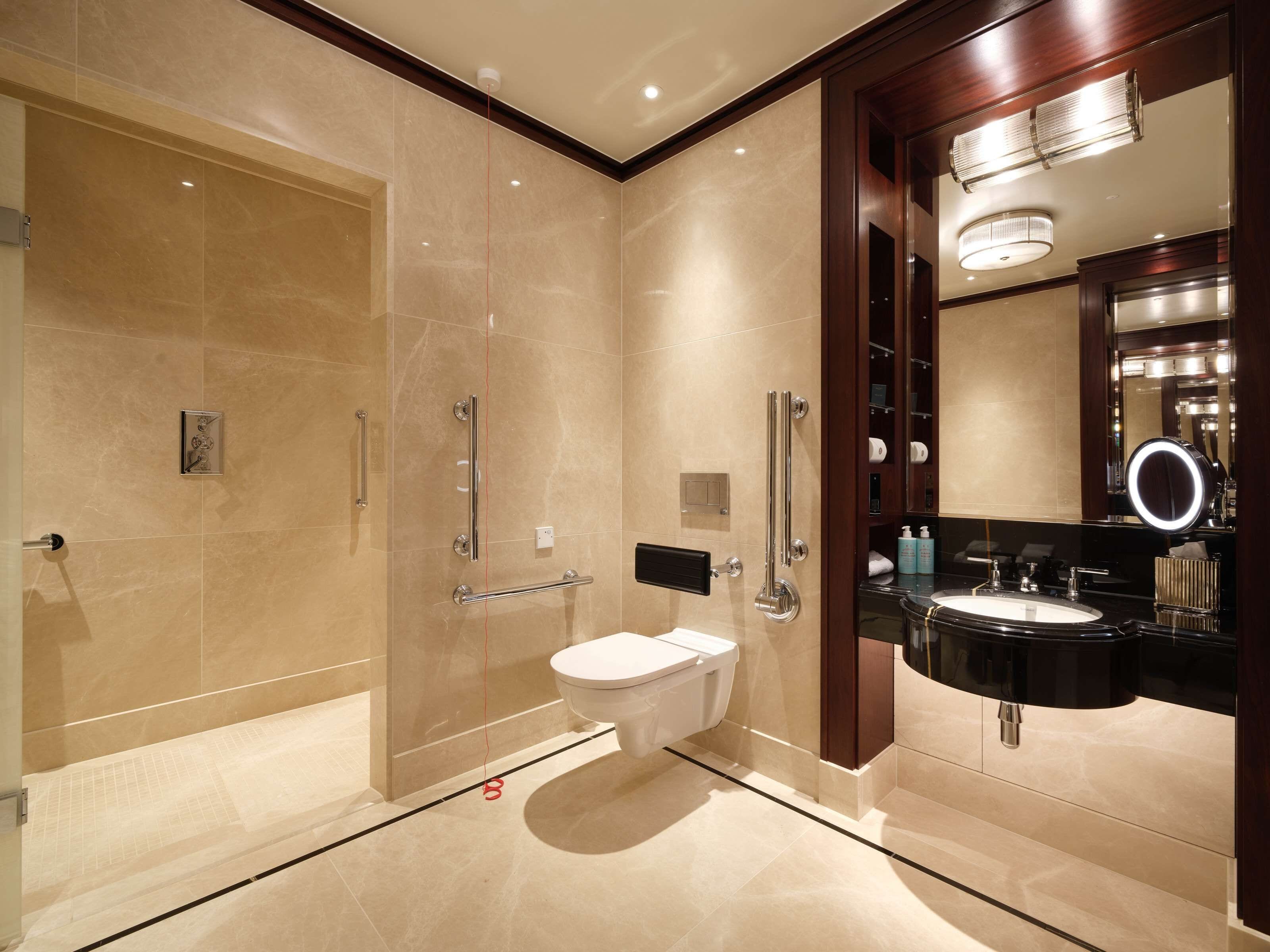 Superior Room | Bathroom | Rainfall showerhead, designer toiletries, hair dryer, bathrobes
