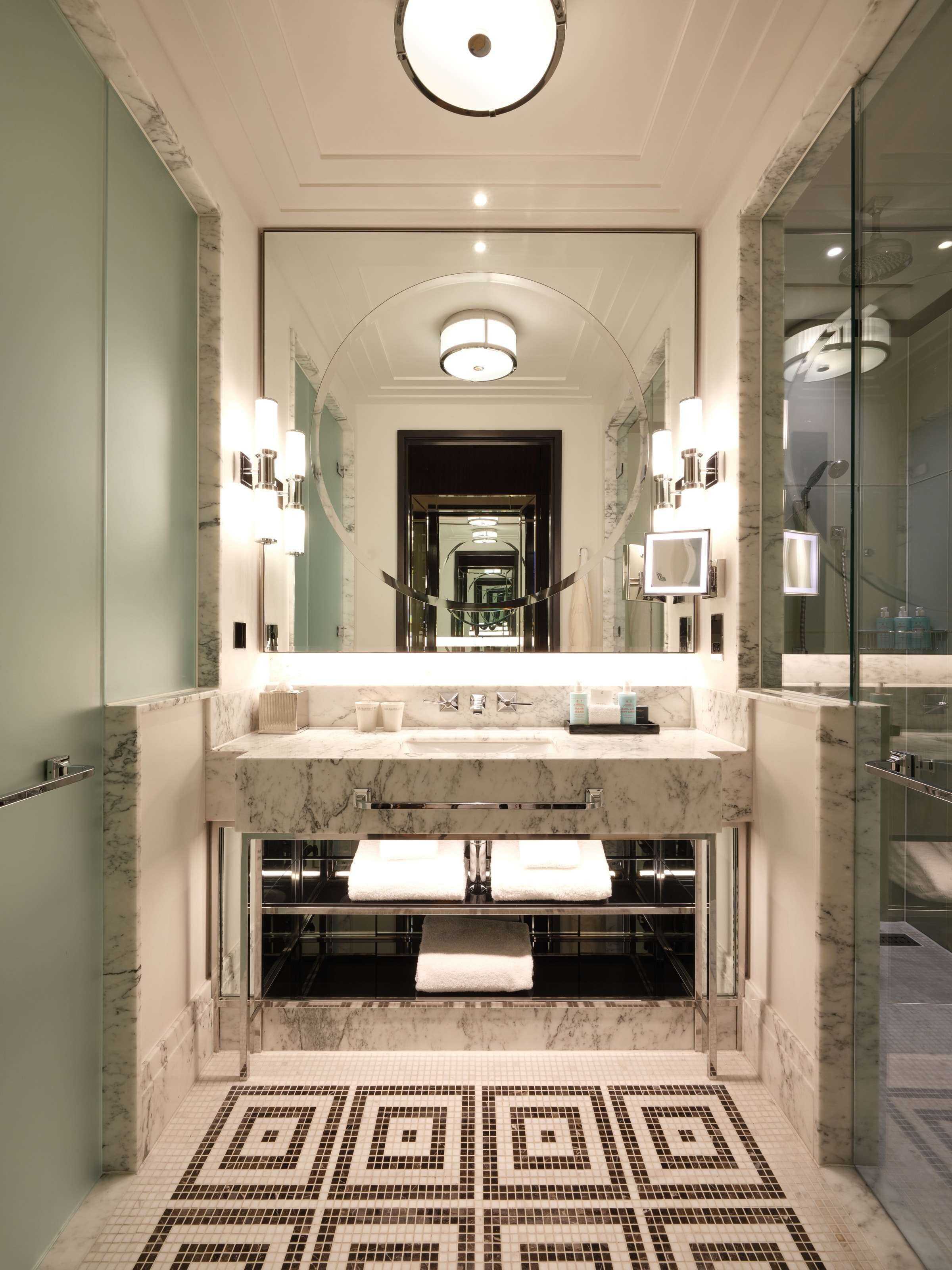 rainfall showerhead, designer toiletries, hair dryer, bathrobes