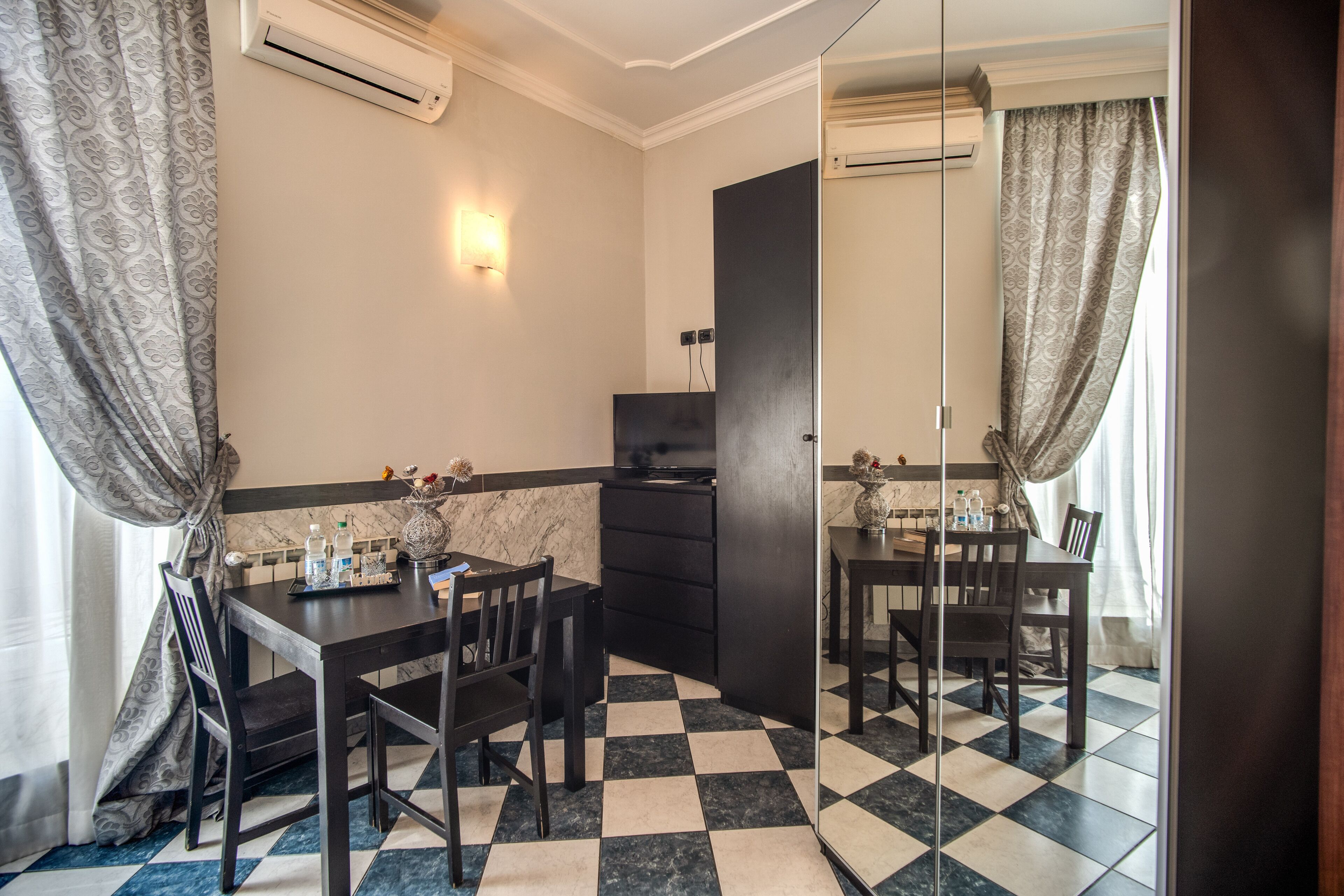 quadruple room | in-room safe, desk, blackout curtains, soundproofing