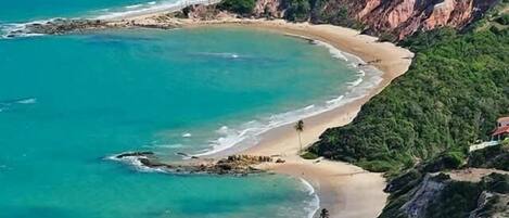 On the beach, sun loungers