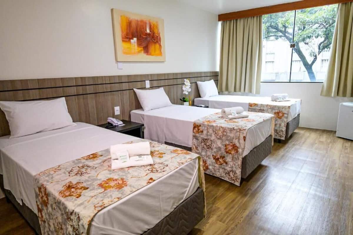 Standard Triple Room | Minibar, desk, free WiFi, bed sheets