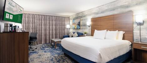 Premium bedding, pillow-top beds, desk, laptop workspace