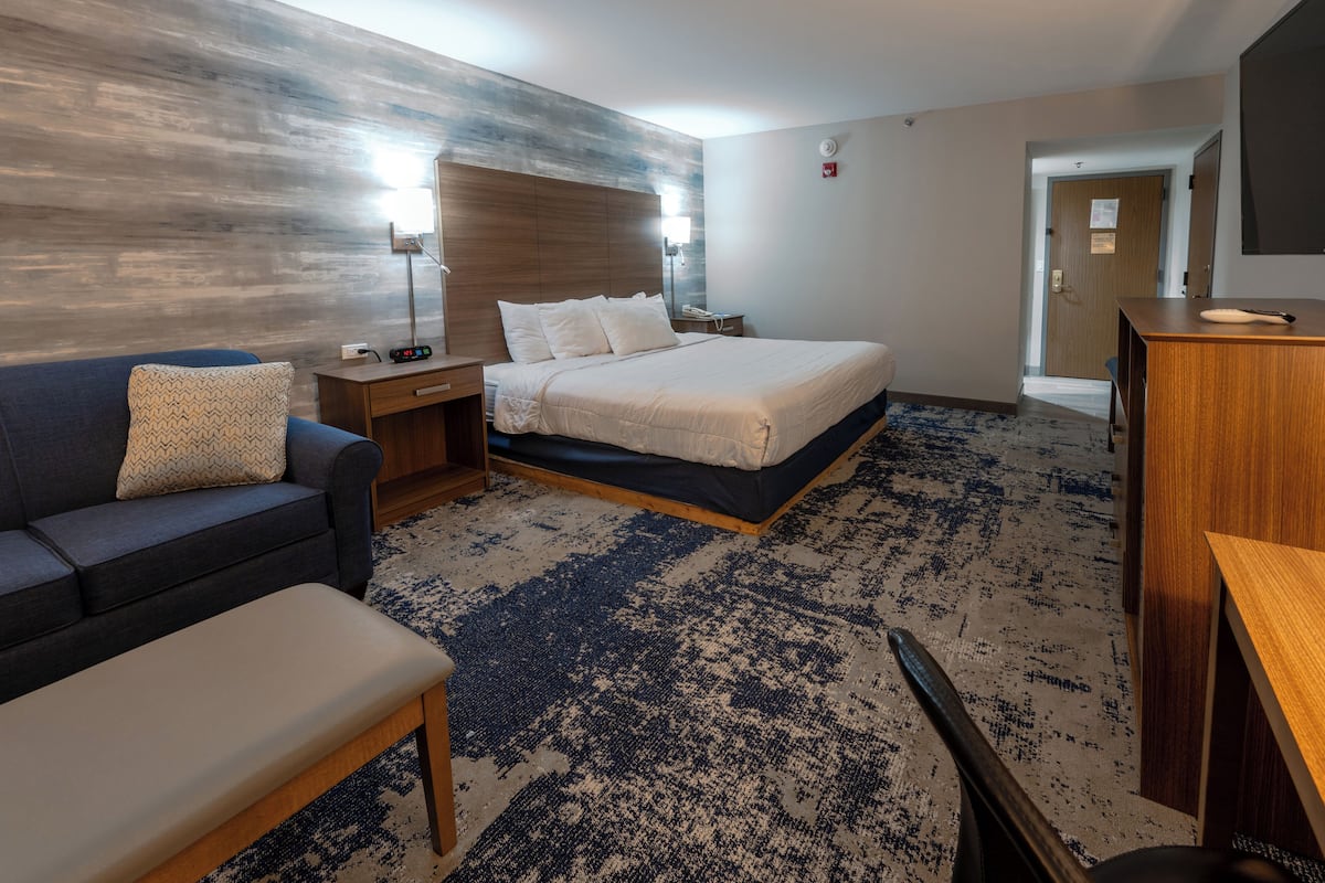 Premium bedding, pillow-top beds, desk, laptop workspace