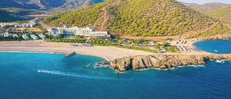 On the beach, sun loungers, beach umbrellas, beach towels